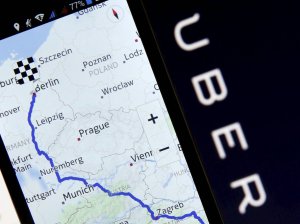 Nokia Maps is seen on a smartphone in front of a displayed logo of Uber in Zenica, Bosnia and Herzegovina, in this May 8, 2015 photo illustration. 